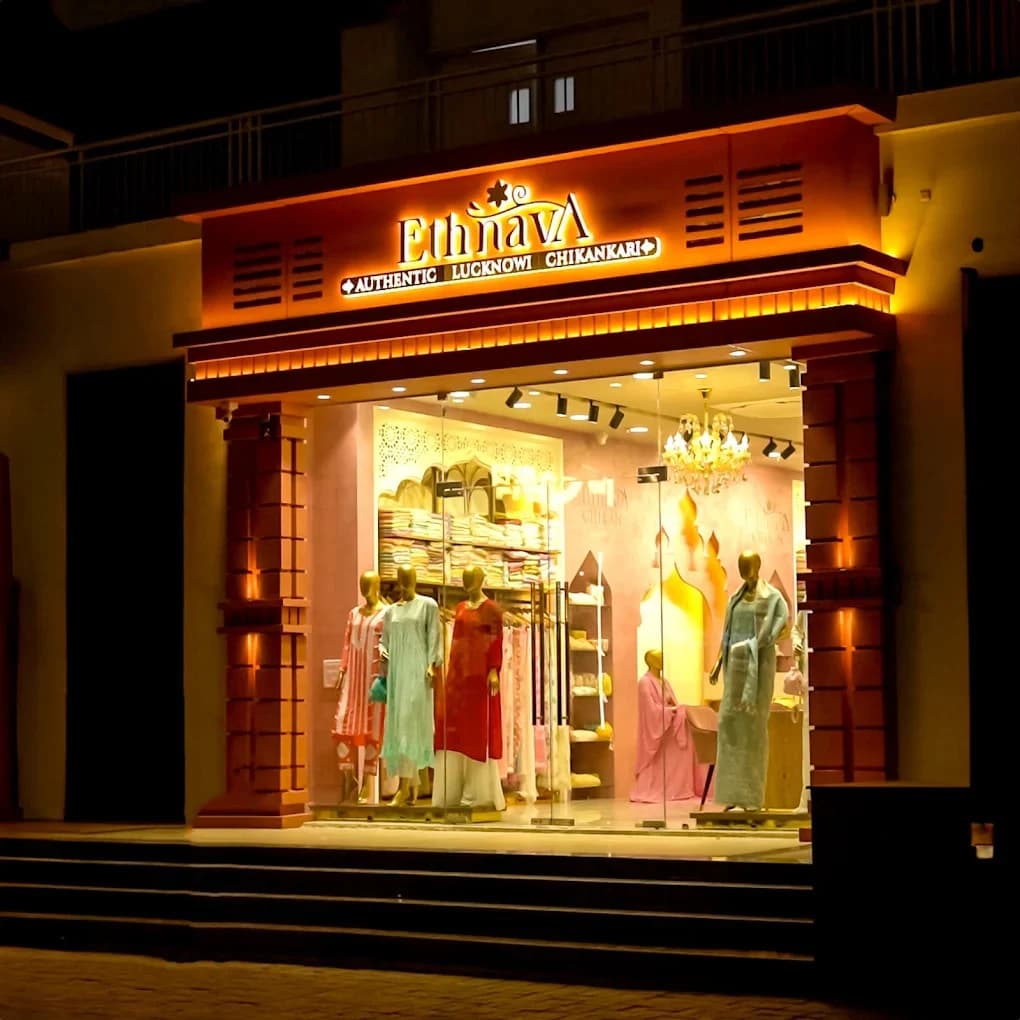 Lucknow Karigars at the embroidery frame
