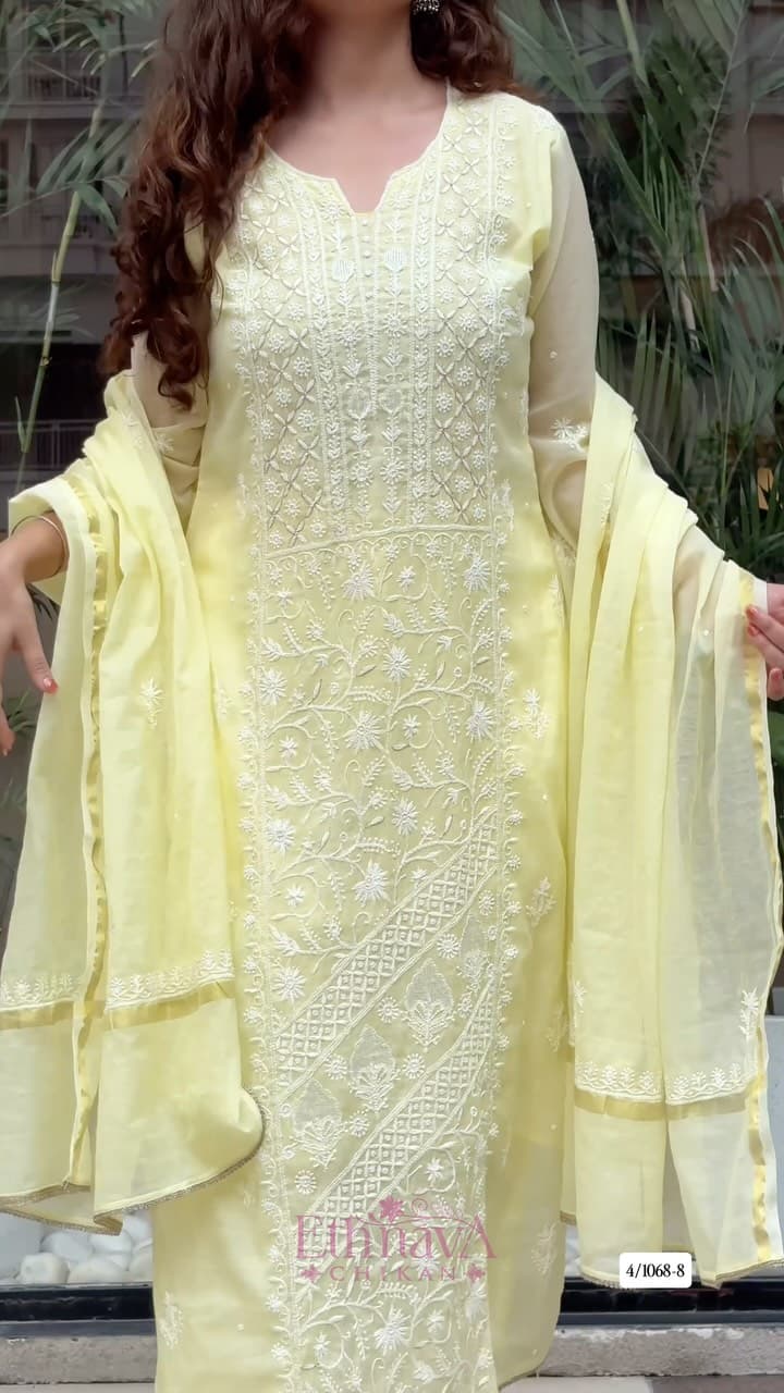 This beautifully crafted 3-piece set in pure Mul Chanderi features intricate Chikankari handwork with Kasab,…